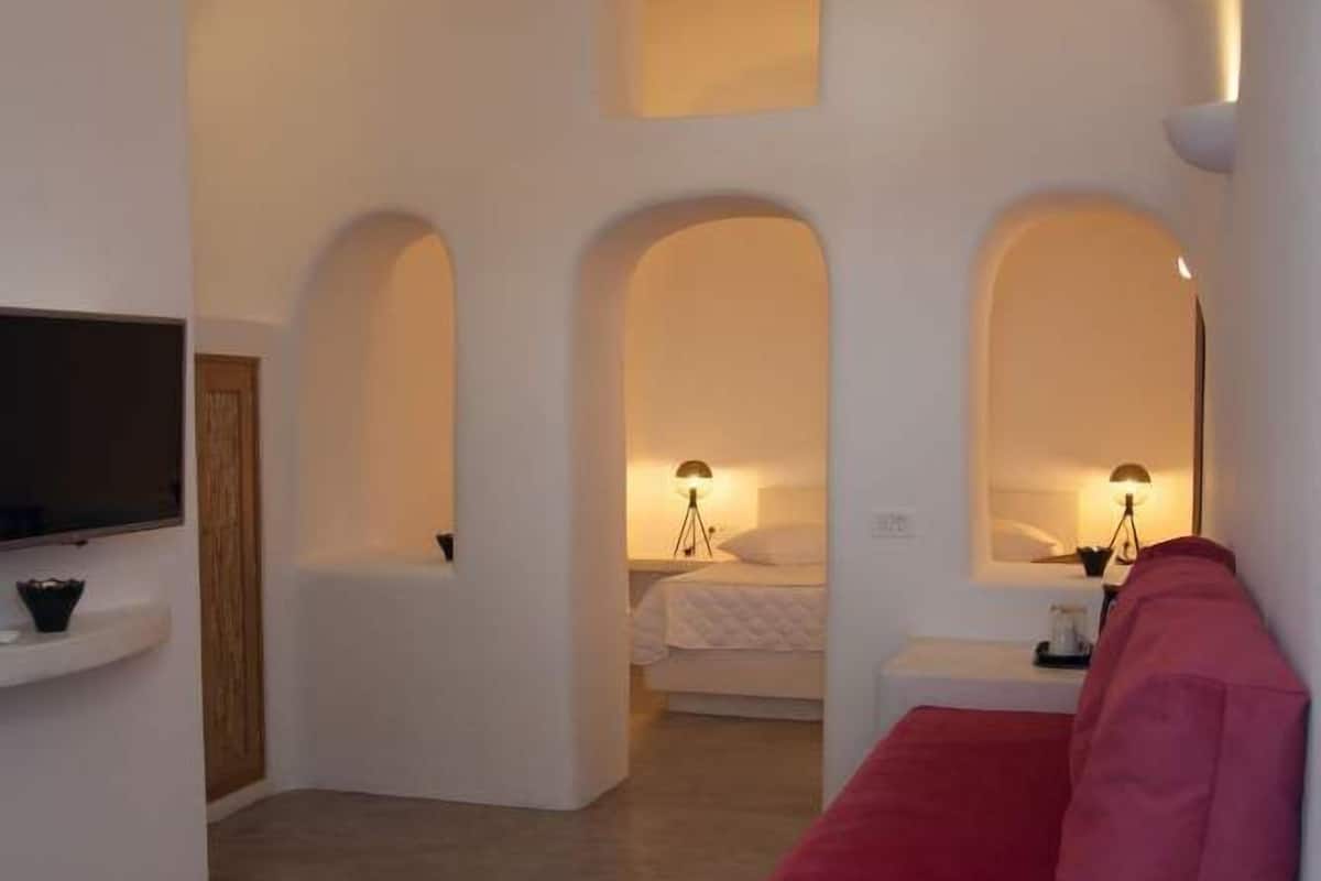 Superior Suite, Sea View | Living area | 32-inch flat-screen TV with satellite channels, TV