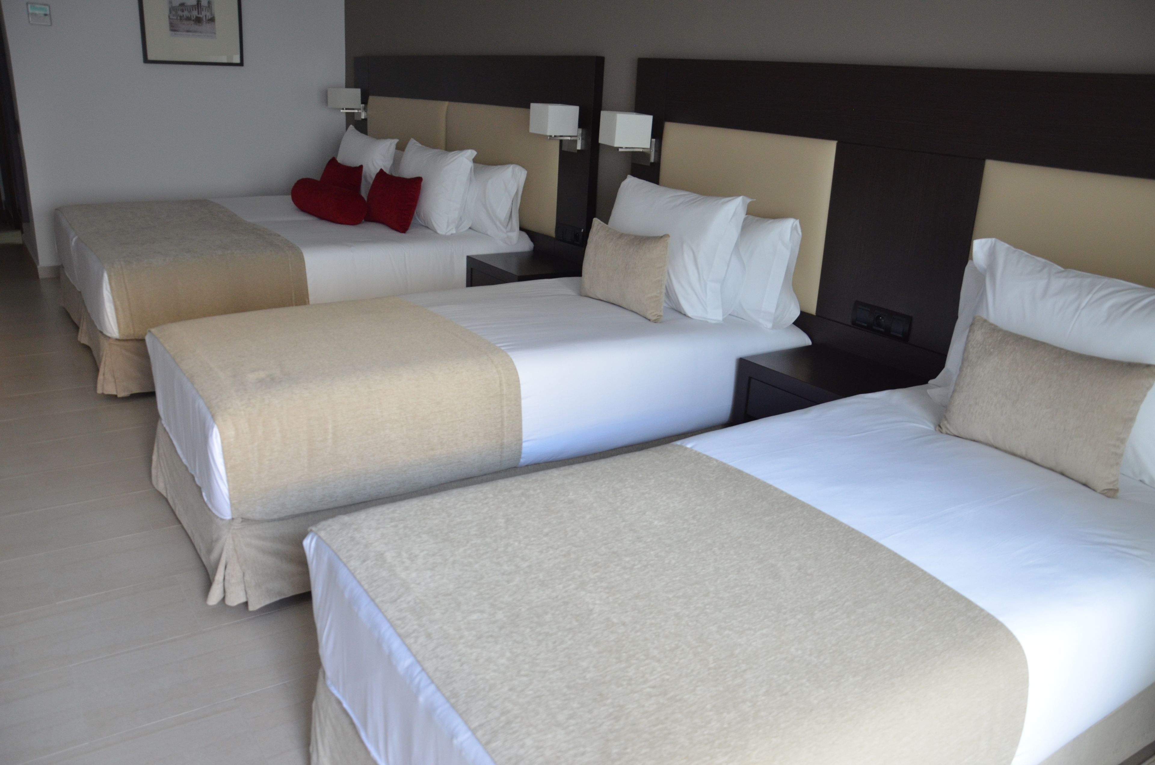 family room | premium bedding, minibar, in-room safe, desk
