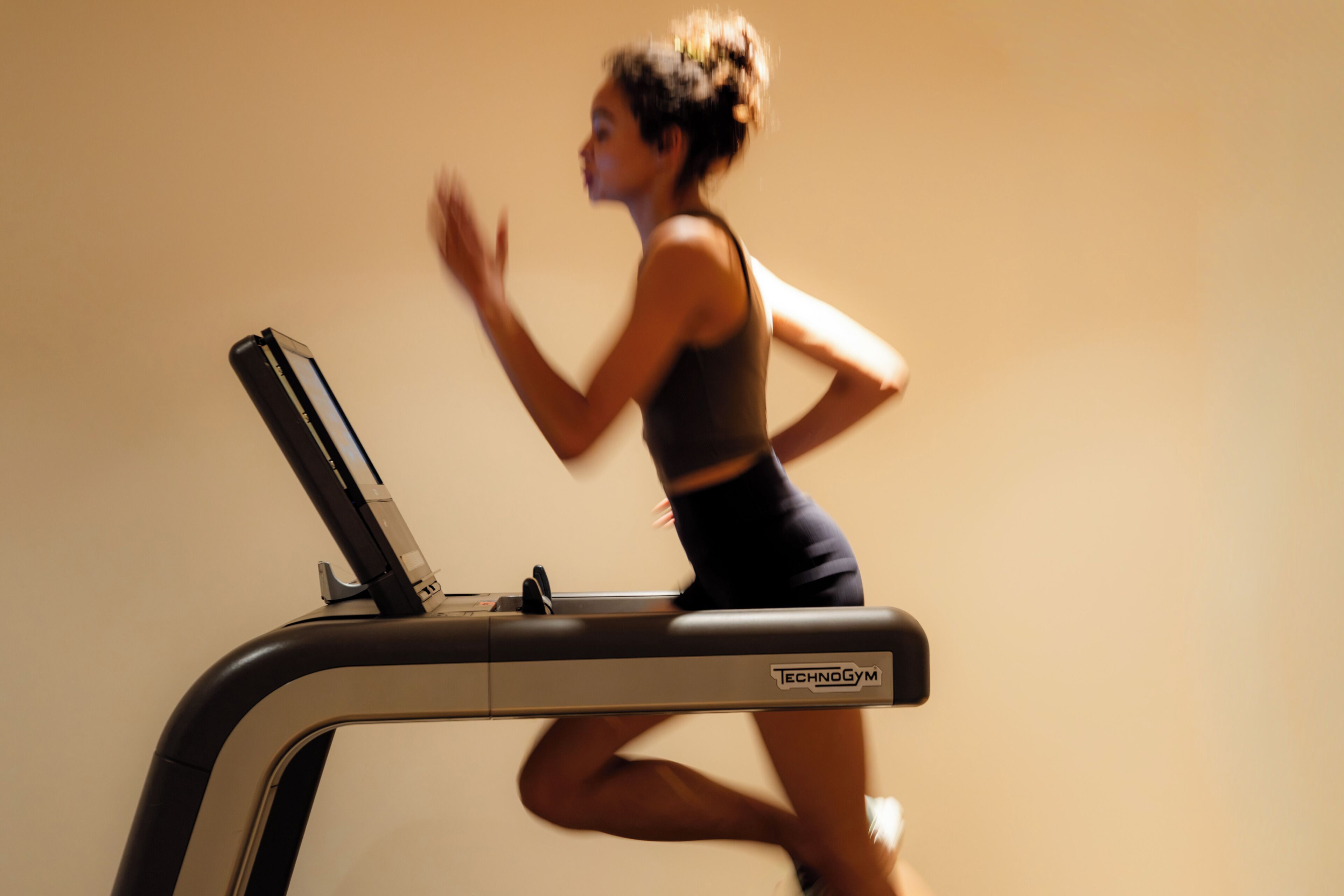 A person running on a treadmill.
