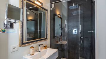 Double Room | Bathroom | Rainfall showerhead, designer toiletries, hair dryer, slippers