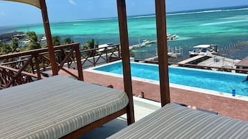 Outdoor pool, open 8:00 AM to 10:00 PM, pool umbrellas, sun loungers