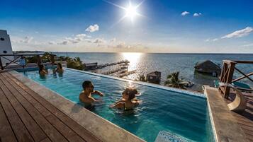 Outdoor pool, open 8:00 AM to 10:00 PM, pool umbrellas, pool loungers