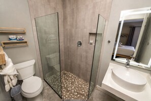 Deluxe Double Room, 1 Queen Bed, Balcony | Bathroom | Shower, free toiletries, towels, soap - Sandbar Beachfront Hotel & Hostel (San Pedro)