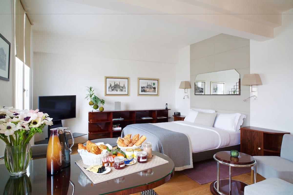 Suite, City View | Premium bedding, in-room safe, individually decorated