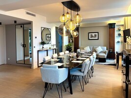 Executive Apartment | Living area | 40-inch flat-screen TV with cable channels, TV, Netflix