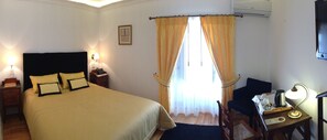 Double Room (Camomila) | Minibar, in-room safe, desk, cots/infant beds