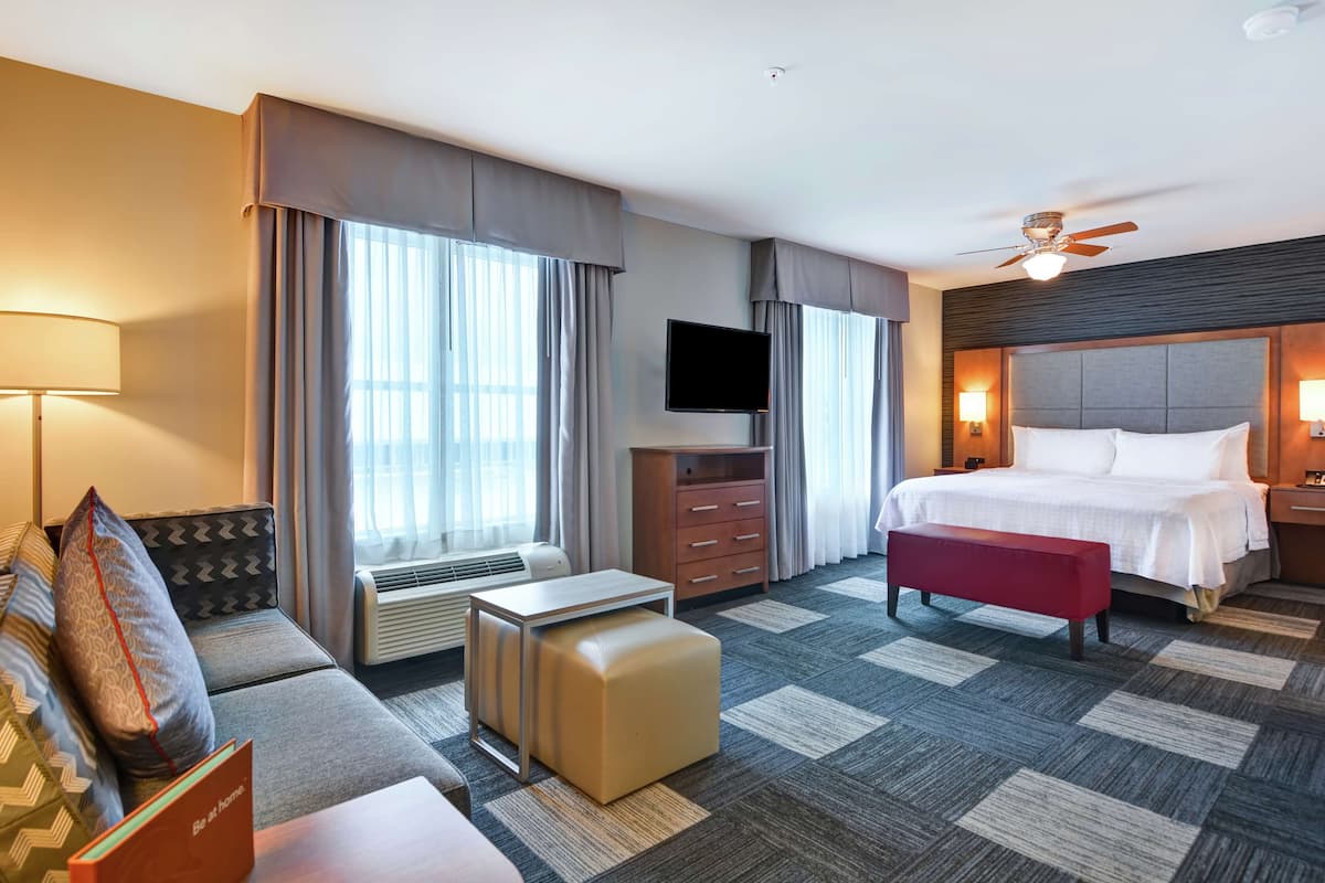 desk, laptop workspace, blackout curtains, iron/ironing board