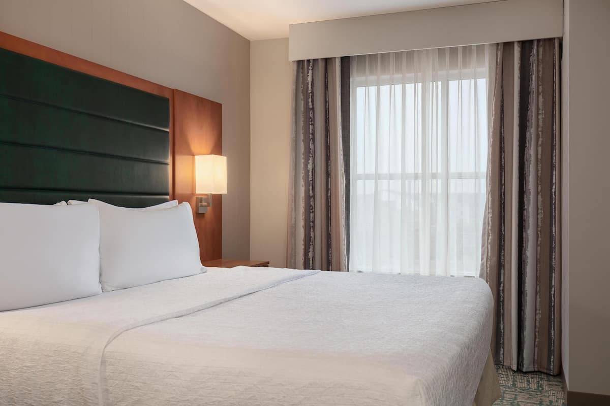 Desk, laptop workspace, blackout curtains, iron/ironing board