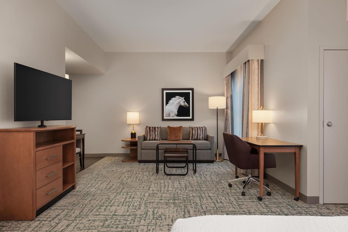 Desk, laptop workspace, blackout curtains, iron/ironing board