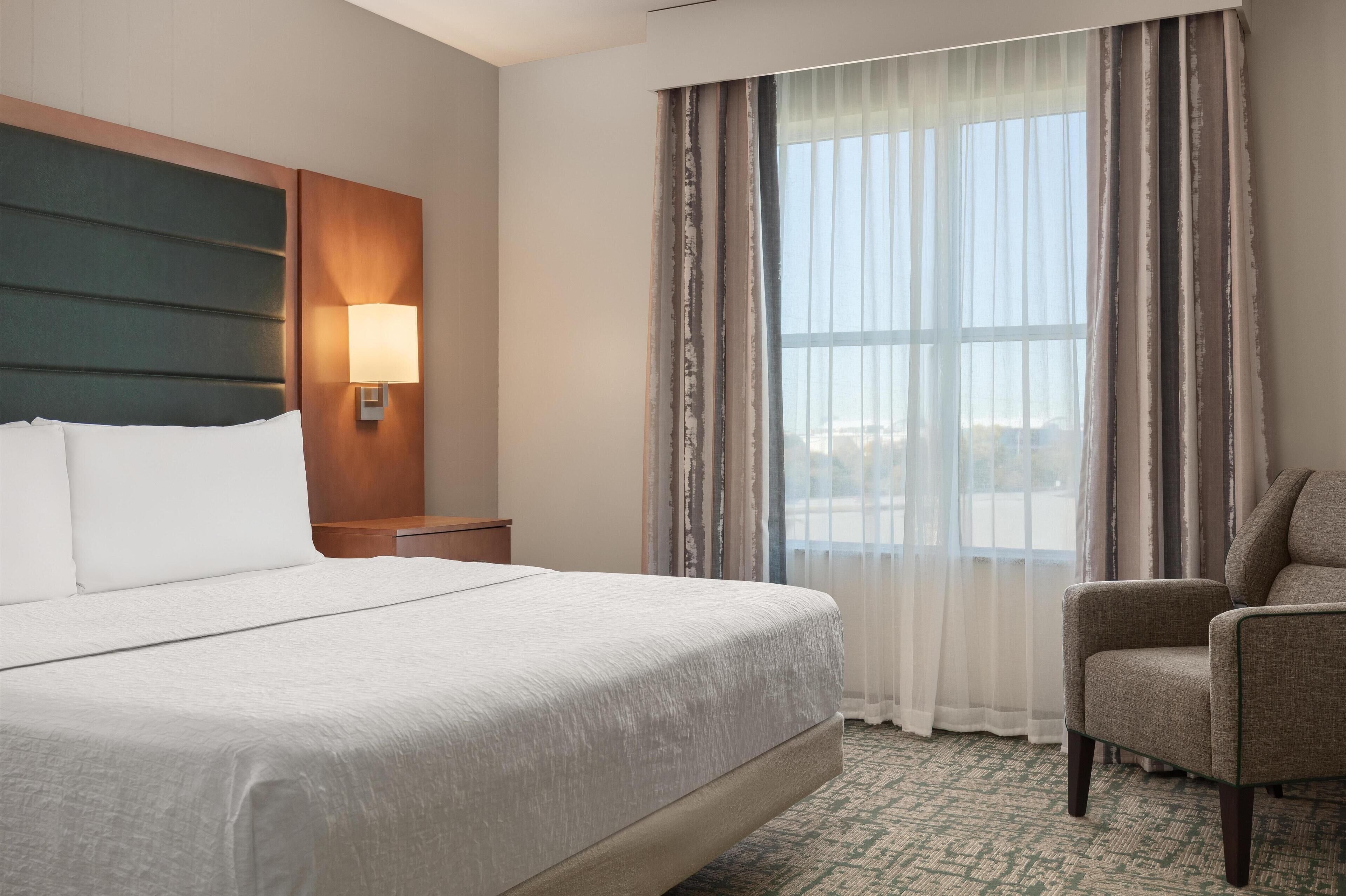 Desk, laptop workspace, blackout curtains, iron/ironing board