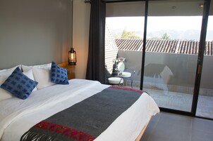 Deluxe Room, Balcony | Egyptian cotton sheets, premium bedding, down comforters, in-room safe