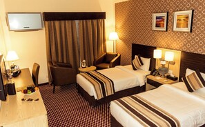 Standard Room | 1 bedroom, minibar, in-room safe, desk