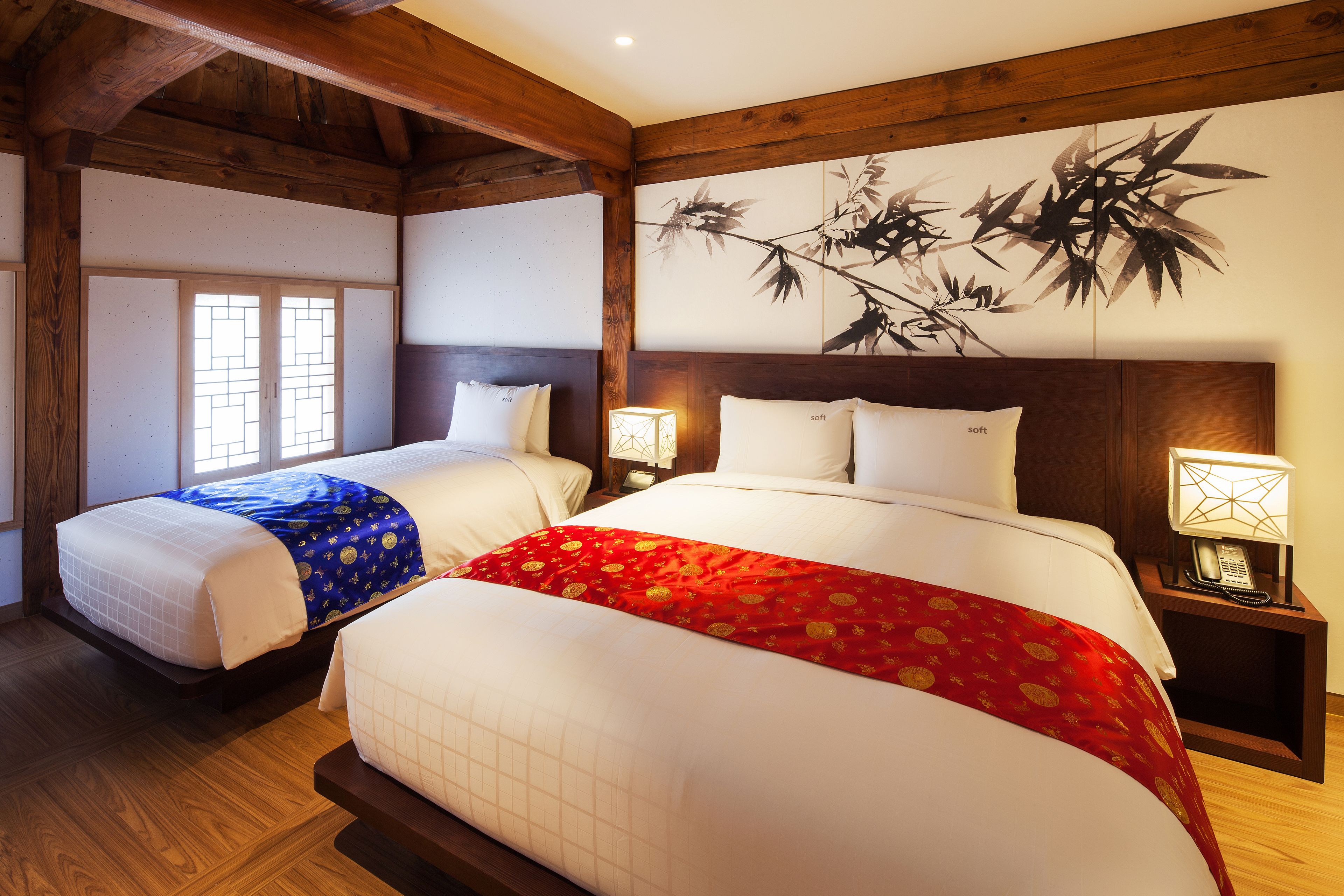 deluxe double room, multiple beds | free minibar, in-room safe, desk, laptop workspace