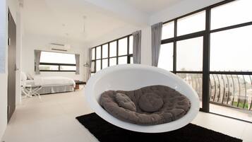 Luxury Double Room, 1 Queen Bed, Balcony, Sea Facing | Living area | Flat-screen TV