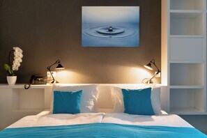 Luxe beddengoed, een kluis op de kamer, een bureau, gratis wifi