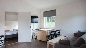 Basic-Ferienhaus, 1 Schlafzimmer | Wohnbereich | Fernseher