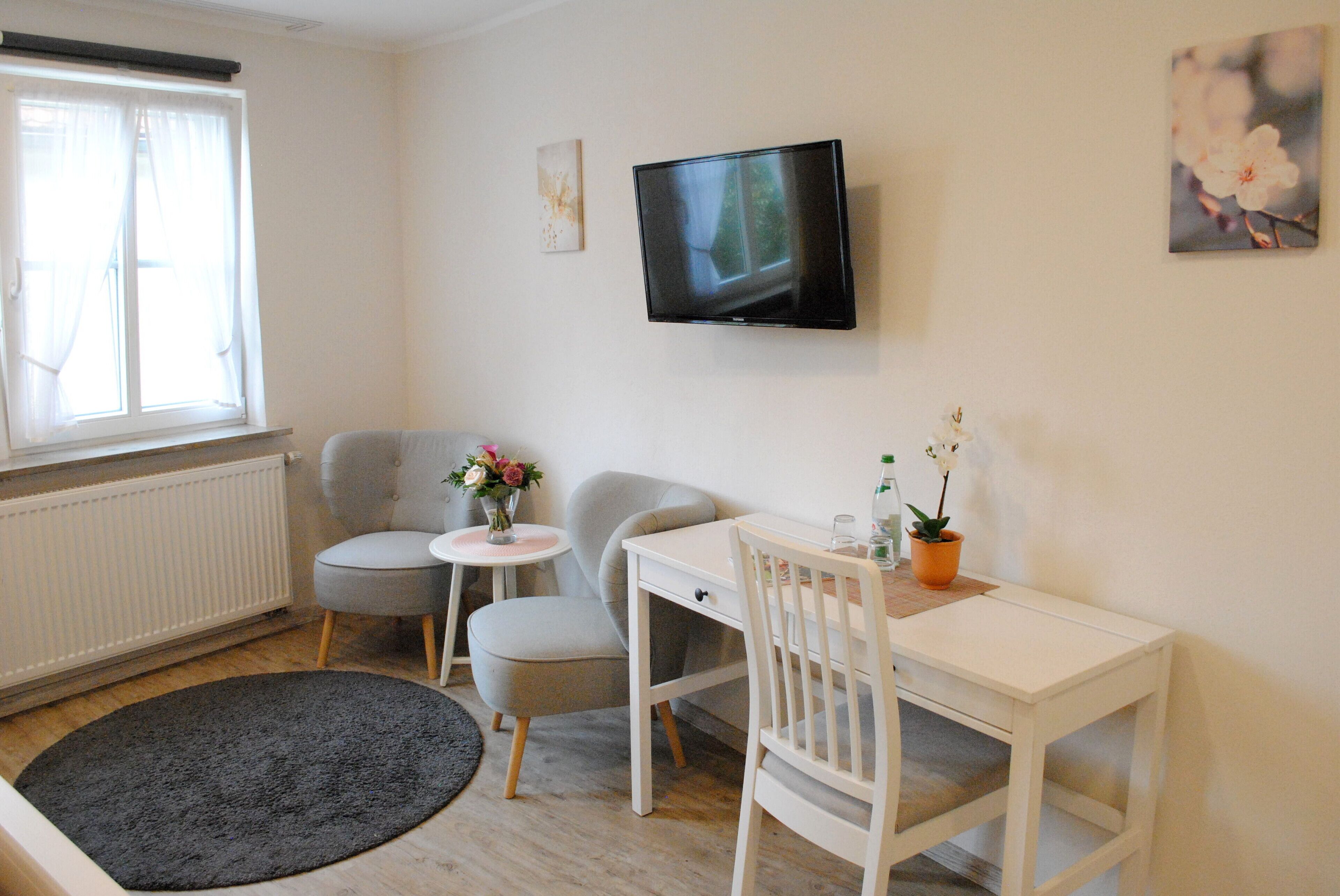 big double room | living area | flat-screen tv