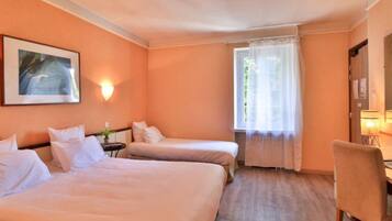 Ropa de cama de alta calidad y minibar