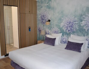 Ropa de cama de alta calidad y minibar