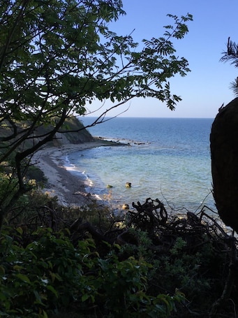 Una playa cerca, arena blanca. Grønbechs Hotel
