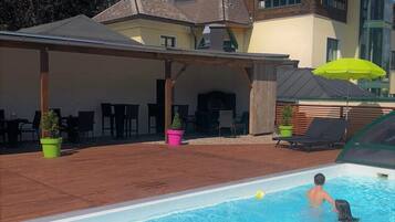 Seasonal outdoor pool, pool umbrellas, sun loungers