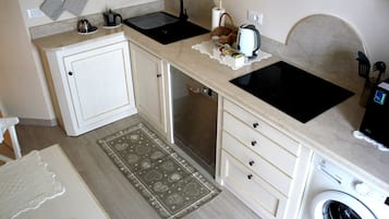 Departamento, 2 habitaciones | Cocina privada | Refrigerador con congelador, microondas y parrilla de estufa
