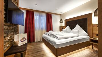 Suite familiar | 1 dormitorio, ropa de cama de alta calidad, minibar y caja fuerte