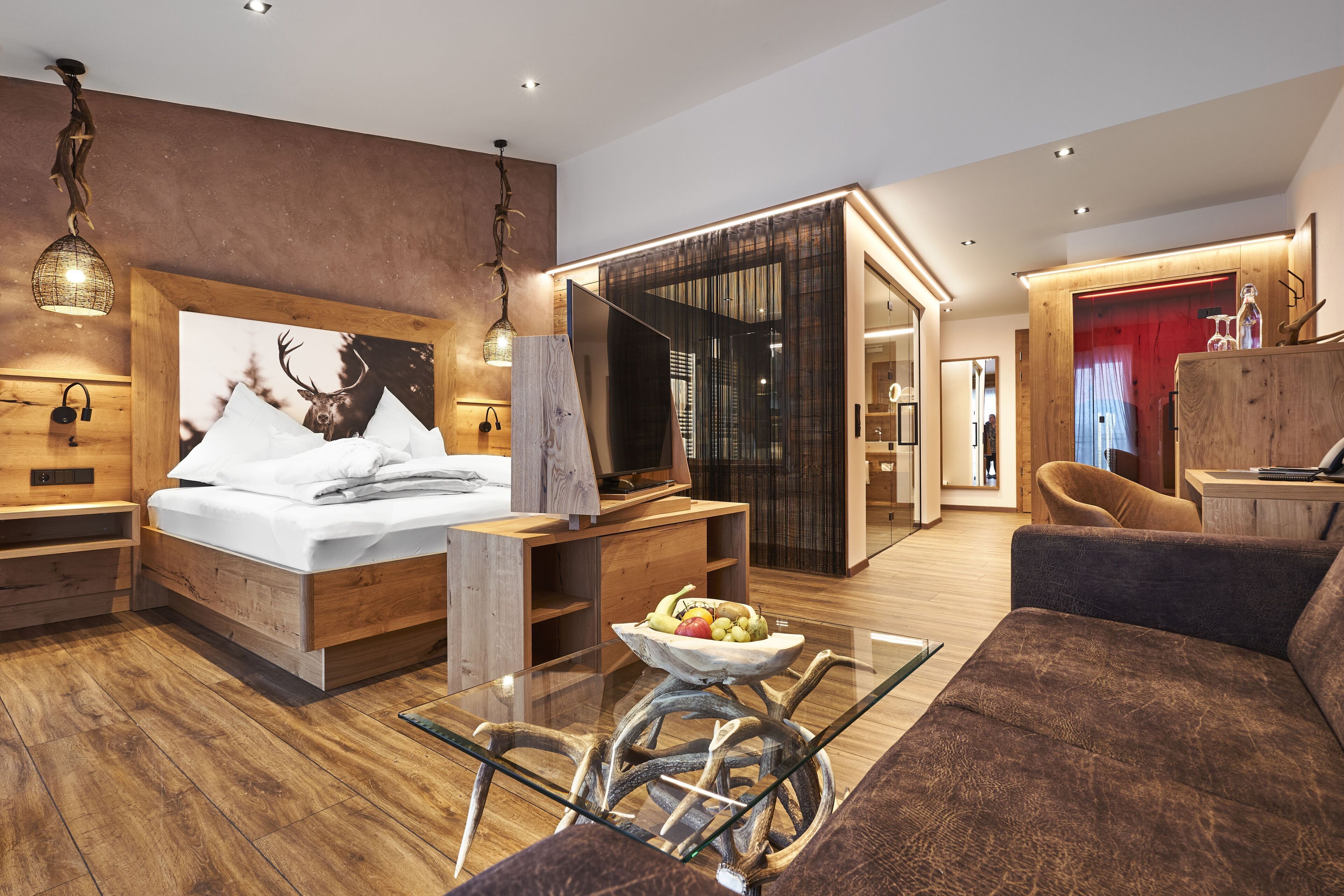 premium room | living area | flat-screen tv