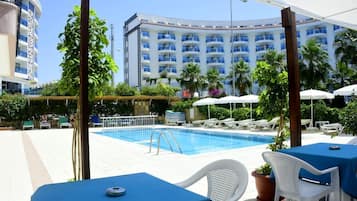 Outdoor pool, pool umbrellas, pool loungers