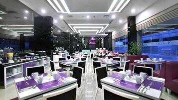 Breakfast, lunch, dinner served; international cuisine