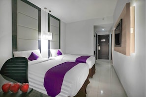 Superior Room | Minibar, in-room safe, desk, blackout drapes