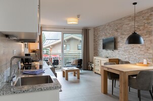 Apartment, 1 Bedroom, Balcony (Excl. 113 EUR cleaning fee) | Living area | Flat-screen TV