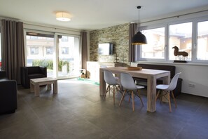 Apartment, 1 Bedroom, 2 Bathrooms (Excl. 113 EUR cleaning fee) | Living area | Flat-screen TV - Ski & Golf Suites by Alpin Rentals - incl Summercard (Zell am See)