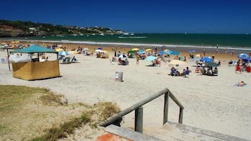 Sun-loungers, beach umbrellas, beach towels