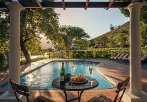 Outdoor pool, pool umbrellas, sun loungers