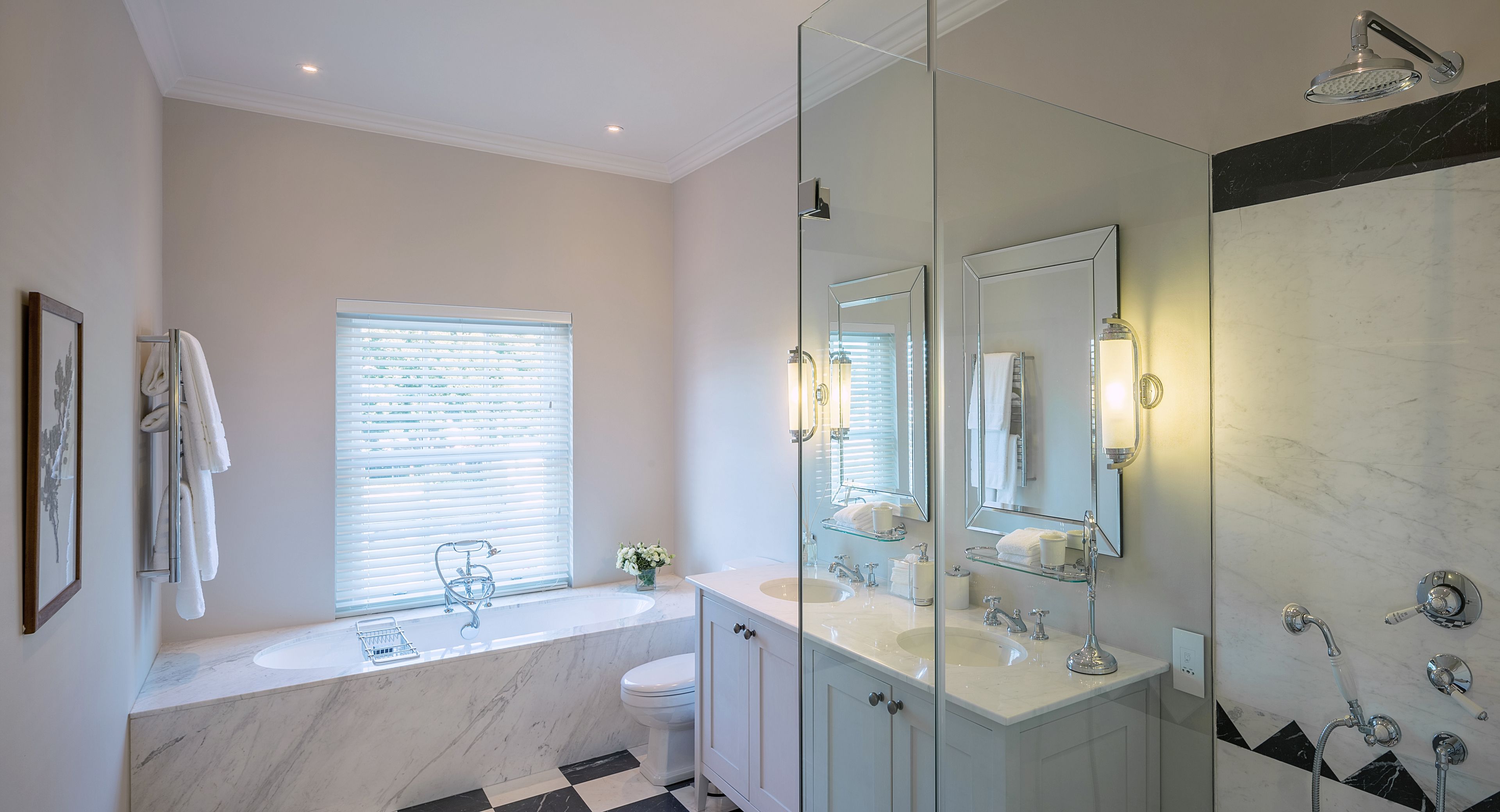 deluxe room | bathroom | designer toiletries, hair dryer, bathrobes, slippers