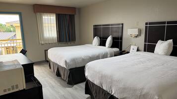 Room, 2 Queen Beds | Desk, iron/ironing board, free WiFi, bed sheets