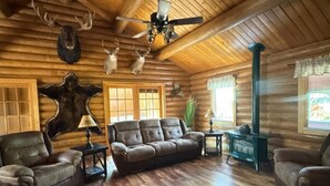 Deluxe Cabin, 2 Bedrooms, Non Smoking, Mountain View | Living room | TV - Silverwolf Log Chalet Resort (Coram)