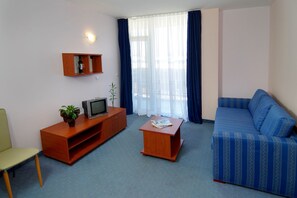 Double or Twin Room | Living area | TV