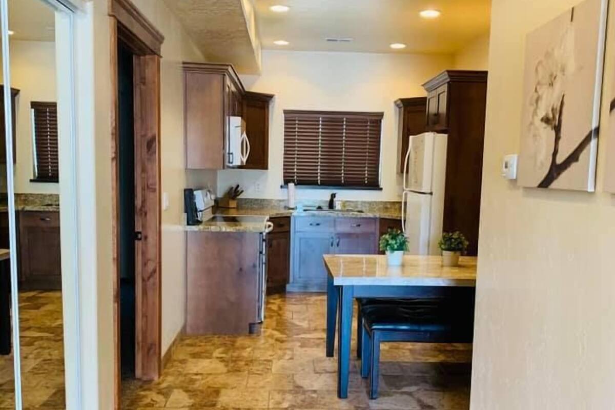 executive townhome, multiple bedrooms, non smoking, pool access | private kitchen | full-sized fridge, microwave, coffee/tea maker, toaster