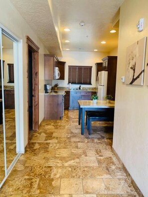 Executive Townhome, Multiple Bedrooms, Non Smoking, Pool Access | Private kitchen | Full-size fridge, microwave, coffee/tea maker, toaster - CB&M Executive Suites (Roosevelt)