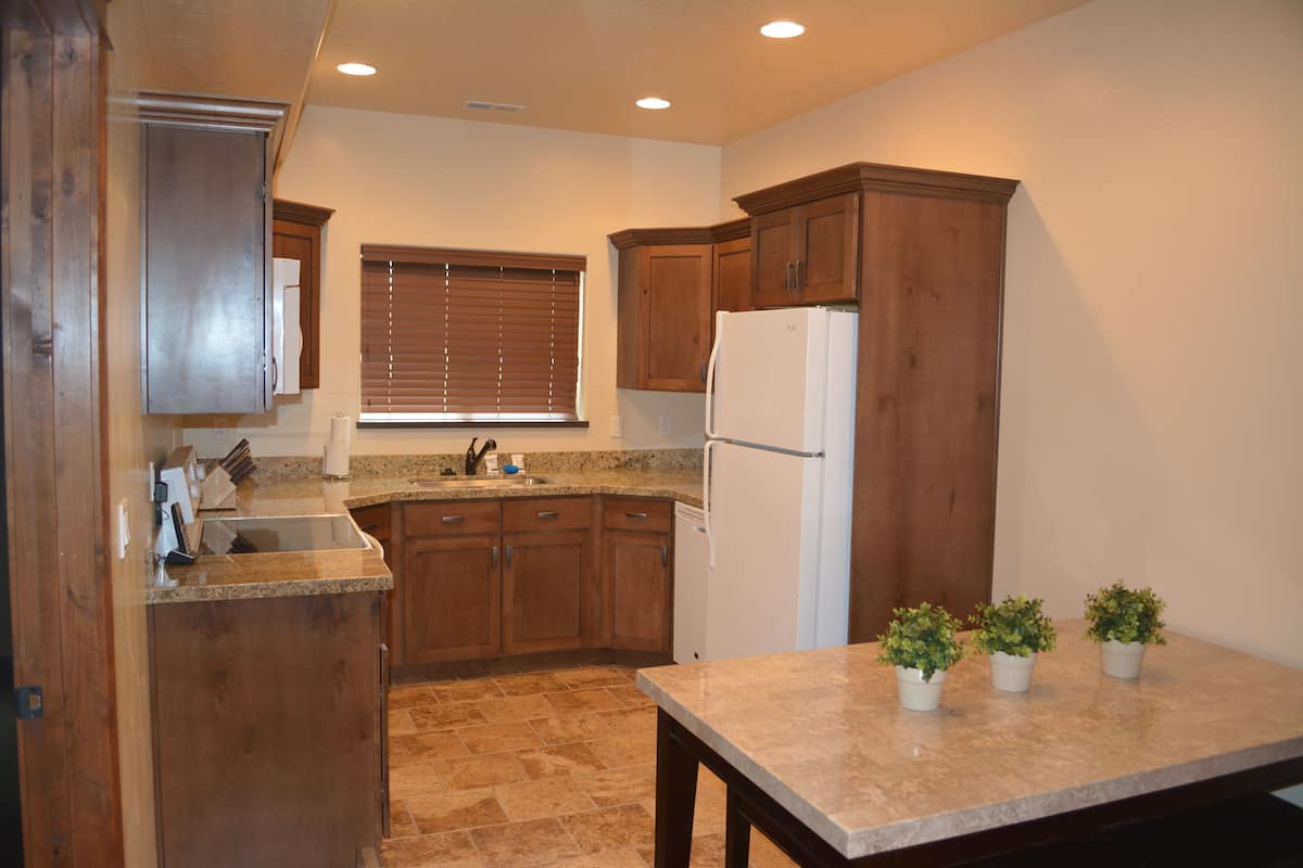 Executive Townhome, Multiple Bedrooms, Non Smoking, Pool Access | Private kitchen | Full-size fridge, microwave, coffee/tea maker, toaster