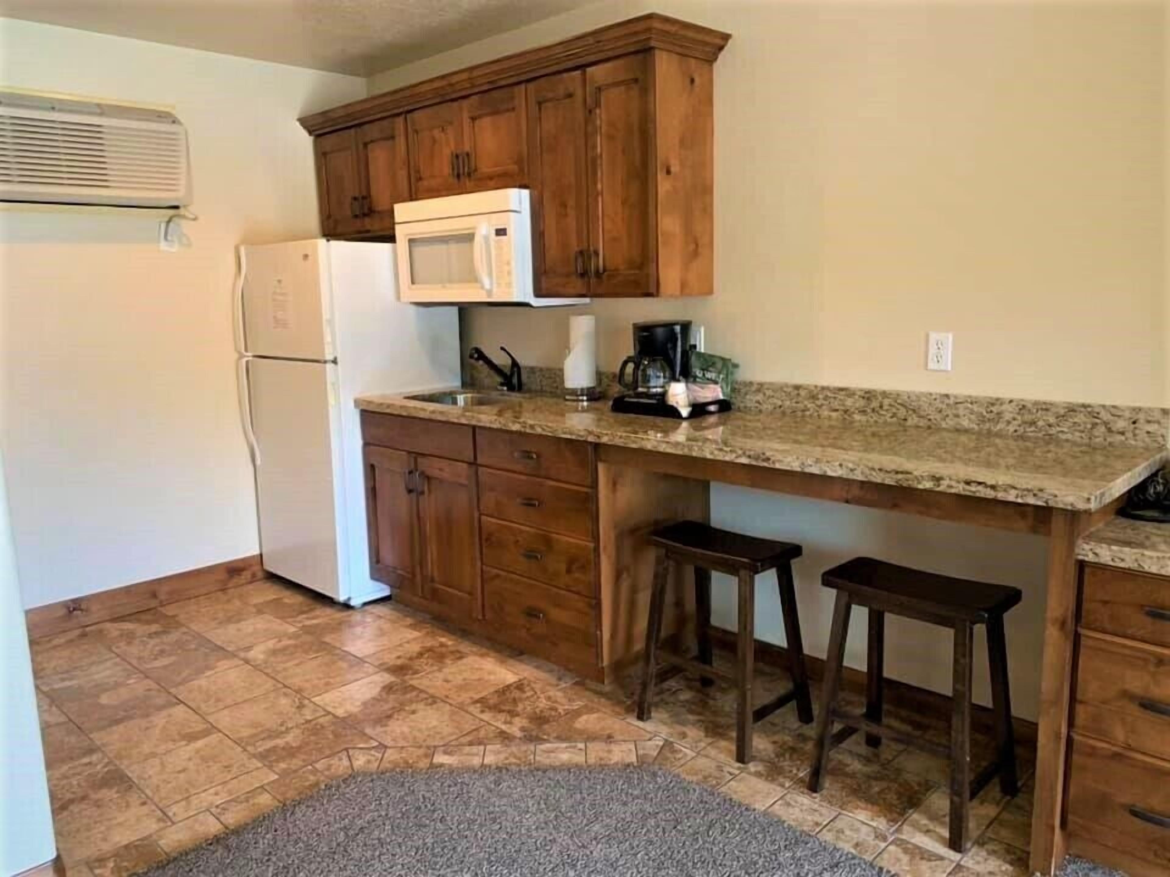 luxury single room, kitchen | private kitchen | full-sized fridge, microwave, coffee/tea maker, toaster