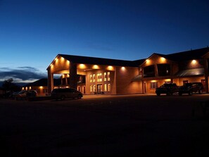 A large, two-story building with a prominent entrance and multiple windows. - CB&M Executive Suites (Roosevelt)