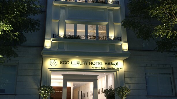 A multi-story building with balconies and a sign reading "ECO LUXURY HOTEL HANOI". -  Eco Luxury Hotel Hanoi (Hanoi)