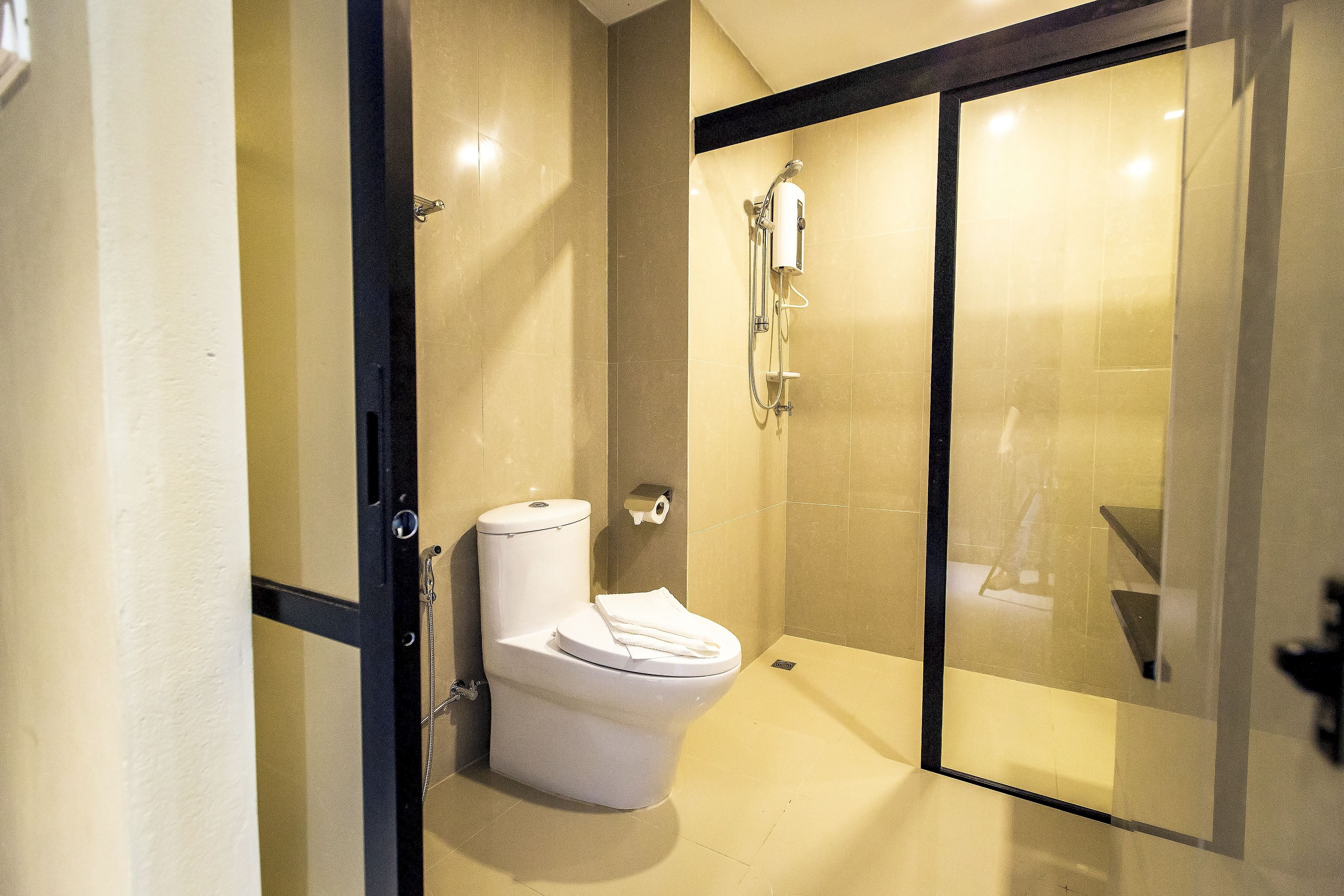 family room | bathroom | shower, free toiletries, hair dryer, slippers