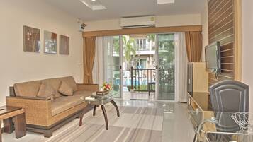 Deluxe Suite, 1 King Bed, Terrace, Pool View | View from room
