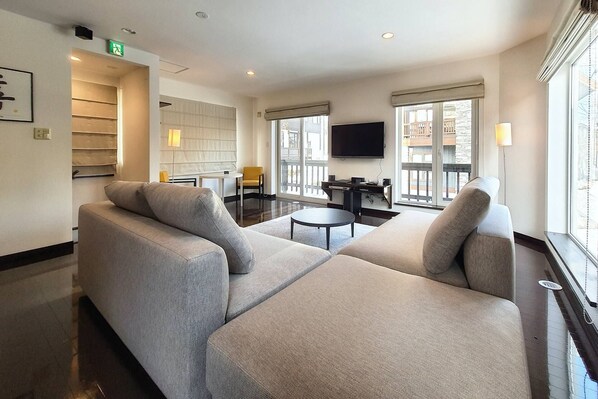 Apartment, 3 Bedrooms | Living area | Flat-screen TV - Yukisawa (Kutchan)