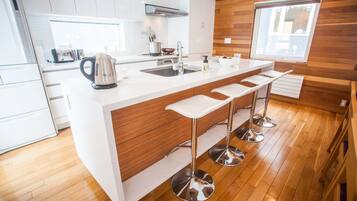 Townhome, 4 Bedrooms | Private kitchenette | Full-size fridge, microwave, oven, stovetop