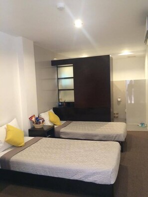 Twin Room, 2 Bedrooms | Desk, blackout curtains, soundproofing, rollaway beds - Be-ing Suites (Davao)
